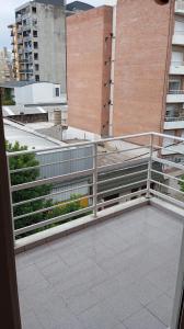 En balkon eller terrasse på departamento