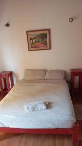 En eller flere senge i et værelse på departamento