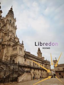 a large building with the words liverpool rooms on it at Libredón Rooms in Santiago de Compostela