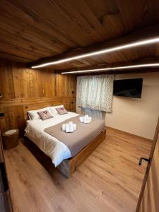 Ένα ή περισσότερα κρεβάτια σε δωμάτιο στο Lo Boneur