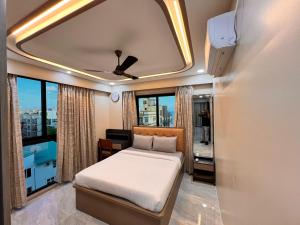 Ένα ή περισσότερα κρεβάτια σε δωμάτιο στο Newtown Inn Service Apartment