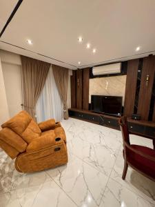 Χώρος καθιστικού στο شقة فندقية فاخرة الدقي 4 غرف نوم Dokki 4 Bedroom Luxury Hotel Apartment