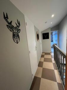 TV a/nebo společenská místnost v ubytování Appartement duplex 2Alpes centre