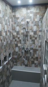 Vannituba majutusasutuses Amitie Chalets Praslin
