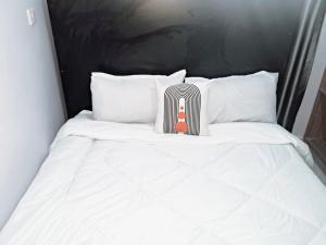 Ένα ή περισσότερα κρεβάτια σε δωμάτιο στο Masaki's Lair