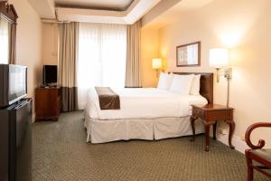 TV a/nebo společenská místnost v ubytování The Inn at Virginia Mason + 21 fotografií