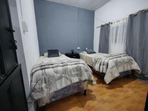 Voodi või voodid majutusasutuse Las Villas toas