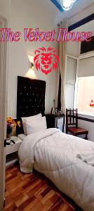 Postel nebo postele na pokoji v ubytování THE velvet HOUSE