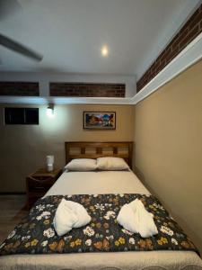 Ένα ή περισσότερα κρεβάτια σε δωμάτιο στο Apartamentos Casa Marco Polo