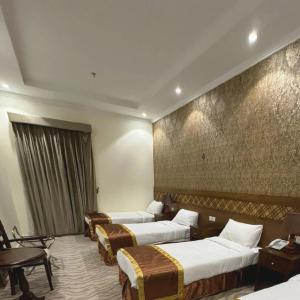 Ένα ή περισσότερα κρεβάτια σε δωμάτιο στο رتاج إن