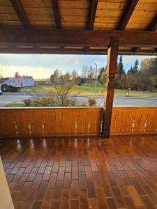 an empty porch with a view of a street at Braukeller Fattigau in Oberkotzau