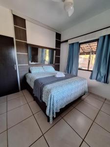 Postel nebo postele na pokoji v ubytování Pousada Caminho das Praias