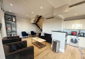 Et opholdsområde på Cape Royale 4BED Suite