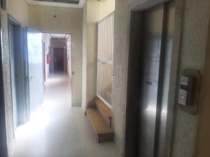 a hallway of a building with a hallwayasteryasteryasteryasteryasteryasteryasteryastery at Hotel Vitória Palace in Sao Paulo