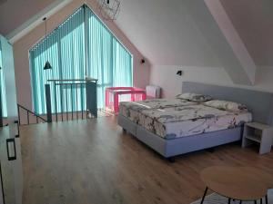 Ένα ή περισσότερα κρεβάτια σε δωμάτιο στο Villa Doma