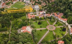an aerial view of a park with a building at Amber Apartman in Banja Koviljača