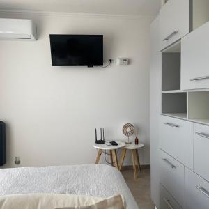 TV a/nebo společenská místnost v ubytování Aire de Mar II - Alojamientos Necochea + 10 fotografií