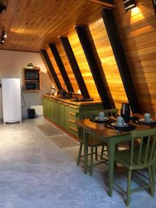 Kuchyň nebo kuchyňský kout v ubytování Chalé Recanto das Águas