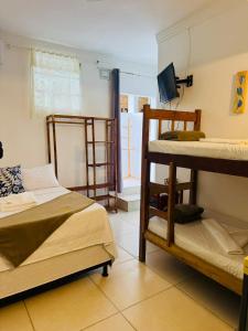 Ένα ή περισσότερα κρεβάτια σε δωμάτιο στο Pousada VB