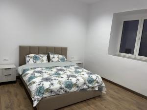 Ένα ή περισσότερα κρεβάτια σε δωμάτιο στο Liçi Guesthouse