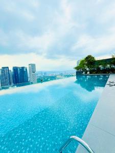 a large swimming pool on top of a building at Dorsett Residences Executive KL in Kuala Lumpur