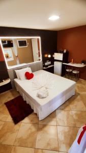 Postel nebo postele na pokoji v ubytování Paradies Hotel e Motel