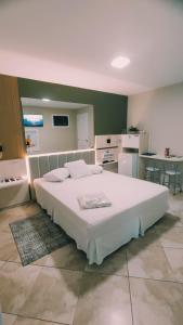 Postel nebo postele na pokoji v ubytování Paradies Hotel e Motel