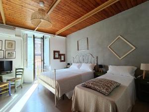 Postel nebo postele na pokoji v ubytování I Vespri + 14 fotografií