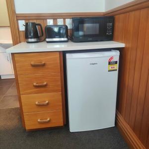 Η κουζίνα ή μικρή κουζίνα στο Huka Villas - Apartment