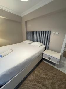 Ένα ή περισσότερα κρεβάτια σε δωμάτιο στο Baran House