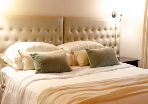 Postel nebo postele na pokoji v ubytování ONA Apart Hotel and Spa