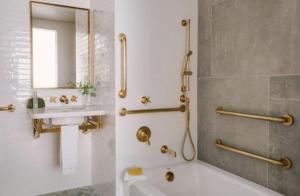 a bathroom with a shower and a sink at Merchant LES in New York