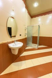 ห้องน้ำของ Veluna Apartments +17 ภาพ