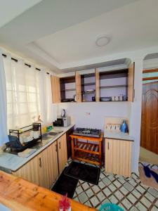 Kuchyň nebo kuchyňský kout v ubytování Haven Homes