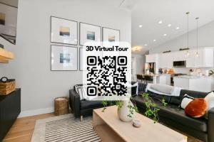 a living room with a couch and a table at LUXE, Breathtaking Mountain Views, Hot Tub, Fire Pit, Fire Pit Table, Pool Table, 2 Living rooms, Universal EV Station in Hendersonville