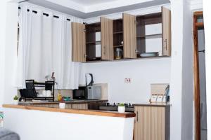 Kuchyň nebo kuchyňský kout v ubytování Haven Homes + 7 fotografií