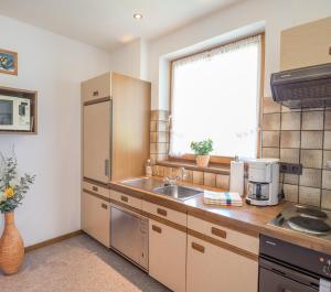 Kuchyň nebo kuchyňský kout v ubytování Piz Arina Inklusiv Premium - Card