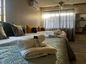 Postel nebo postele na pokoji v ubytování Compass Overnight Langenhovenpark