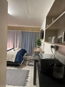 Postel nebo postele na pokoji v ubytování Compass Overnight Langenhovenpark + 5 fotografií