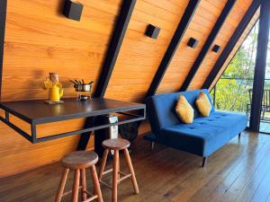 Un lugar para sentarse en Chalés Villa Alecrim 38 fotos más