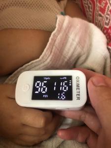 a person holding a remote control in their hands at pina in Bintulu