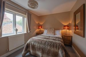 Postel nebo postele na pokoji v ubytování 14 Castlegate, Tutbury
