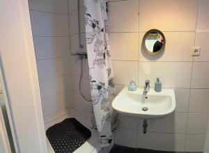 Koupelna v ubytování Cataleya Apartament + 6 fotografií