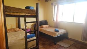 Ένα ή περισσότερα κρεβάτια σε δωμάτιο στο La Magia del Colibrí