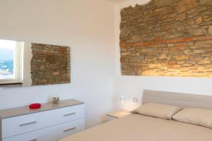 En eller flere senge i et værelse på Terra d'Arezzo + 2 billeder