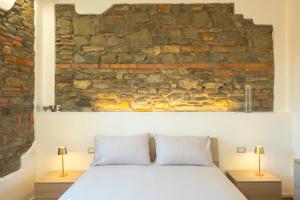 En eller flere senge i et værelse på Terra d'Arezzo