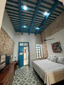 Voodi või voodid majutusasutuse Casita de la 12 5 min a centro Campeche ideal para 2 ó 3 personas Cocina con estufa de inducción, microondas y refrigerador toas +27 fotot