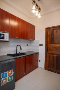 Η κουζίνα ή μικρή κουζίνα στο Chambre 4 etoiles