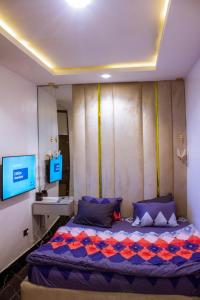 Ένα ή περισσότερα κρεβάτια σε δωμάτιο στο New 3 Bed Duplex Near Abuja Airport & City Centre