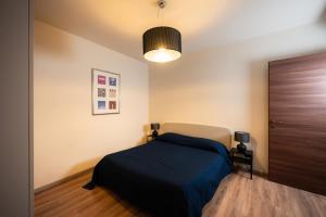 Ένα ή περισσότερα κρεβάτια σε δωμάτιο στο Domus Acaja